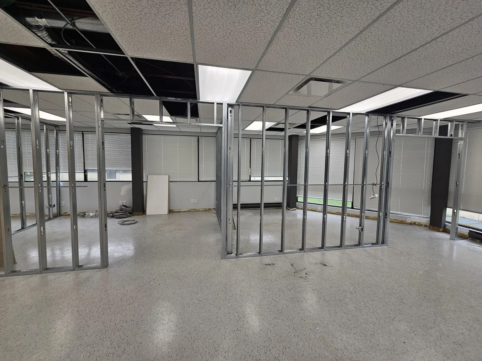 Steel-stud framing of new perimeter offices in an open floor